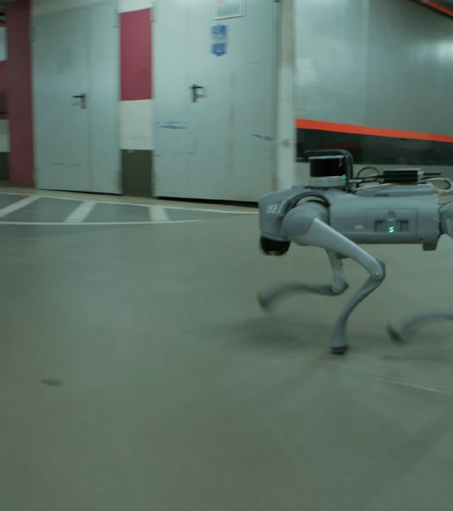 A Nortemsy robot in an underground car park being driven by an operator
